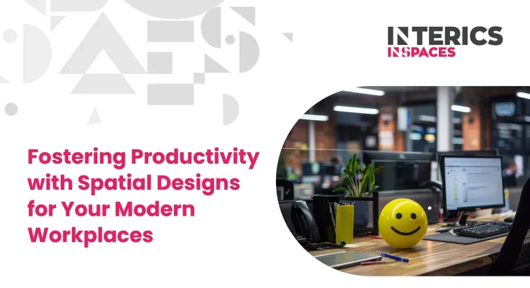 Modern office workspace with computer desk, plant, and smiley stress ball promoting productivity and spatial design.