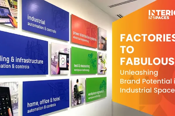 Industrial space branding wall showcasing automation, infrastructure, and workplace technology displays by Interics InSpaces