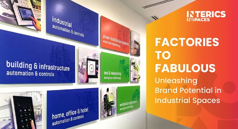 Industrial space branding wall showcasing automation, infrastructure, and workplace technology displays by Interics InSpaces