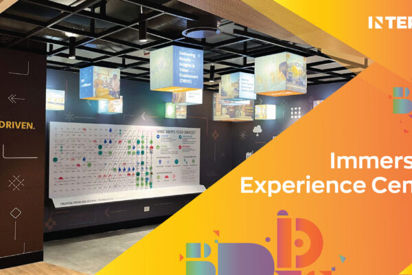 Immersive Experience Centre by Interics showcasing innovative interior branding, suspended digital display cubes, and interactive visual storytelling for corporate environments.